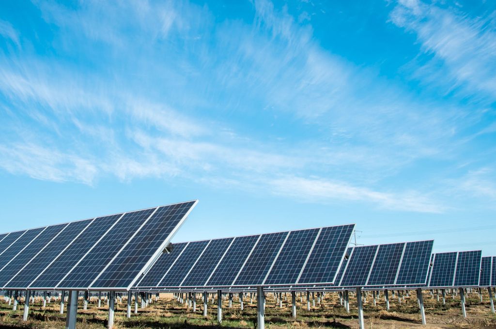 Solar panels under a blue sky